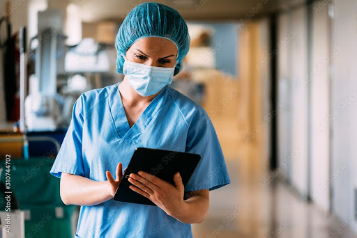 Healthcare professional interacting with technology at Lumina AI Health Institute